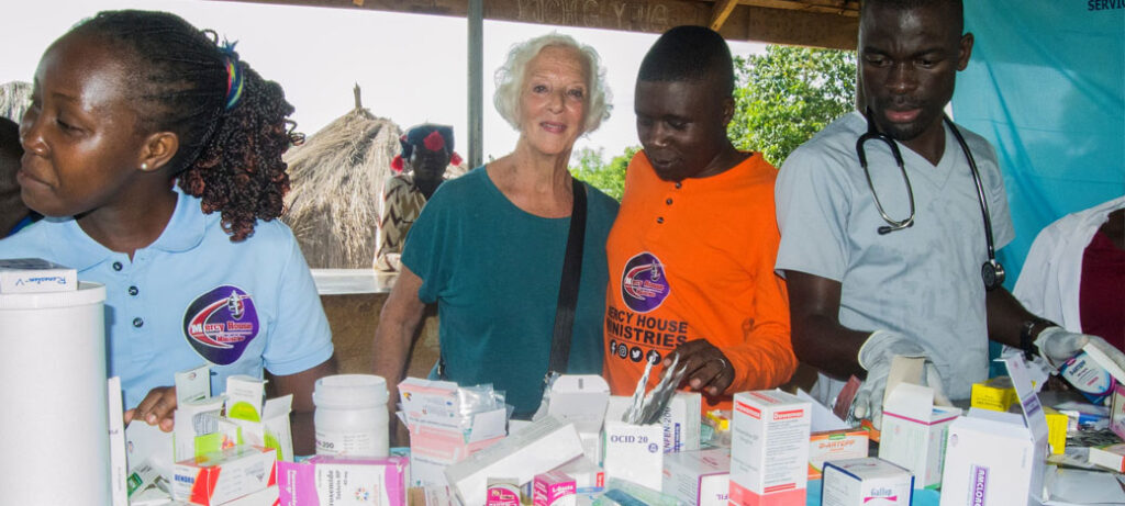 staff getting ready to hand out medical supplies