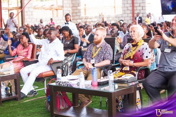 Crowd celebrates 13 years of Mercy House